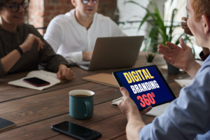 iPad in the hands of a man during the meeting in the office_Page 6_12 from Whiite Modern Good Books Gone Bad Book Cover (A5 Document)